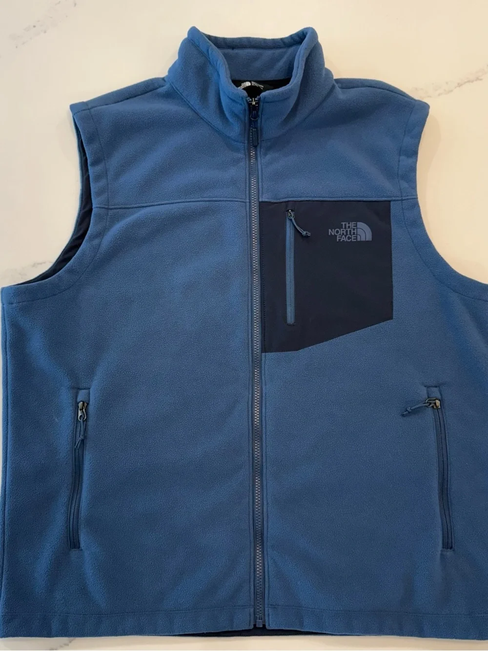The North Face Blue Men’s Fleece Vest with Navy Chest Panel